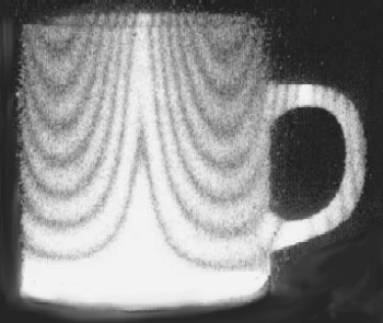 Pictures of standing waves in a cup recorded with holographic interferometry